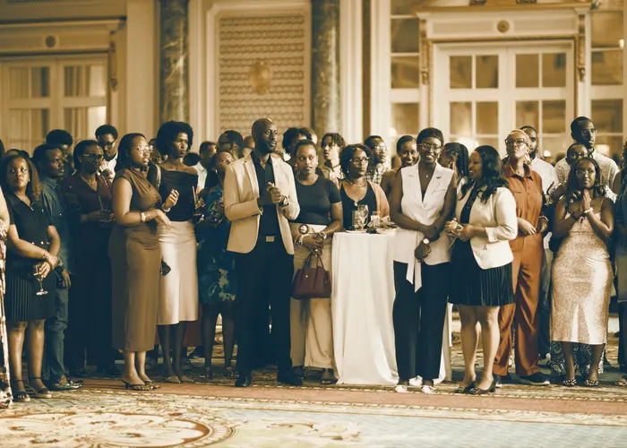 Members of the community gathered in an elegant ballroom